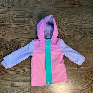 Pink, Purple waterproof jacket. With teal/green detail. Size 2-3years